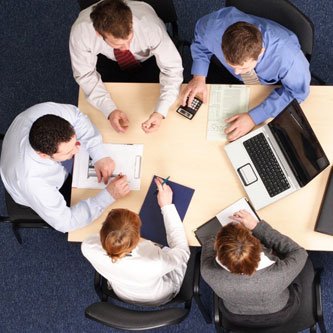 WebClixs team discussing a client requirement